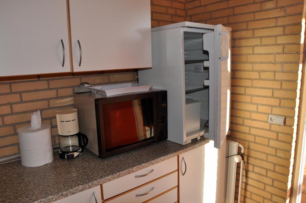 Kuchyň nebo kuchyňský kout v ubytování Løkken Hostel