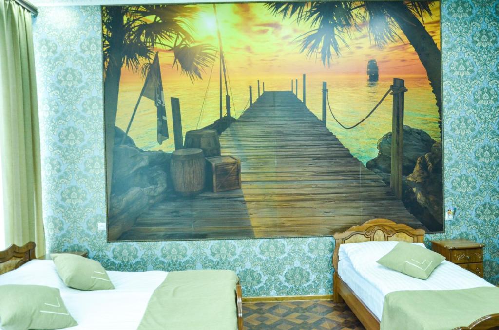 Postel nebo postele na pokoji v ubytování Zangezur Hotel