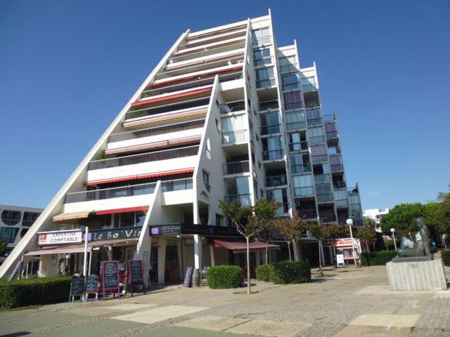 a large white building with a lot of windows at T2 Superbe vue port et mer in La Grande-Motte