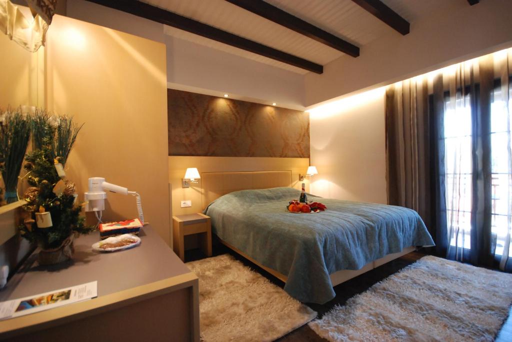 Ένα ή περισσότερα κρεβάτια σε δωμάτιο στο Ξενώνας Χρύσα