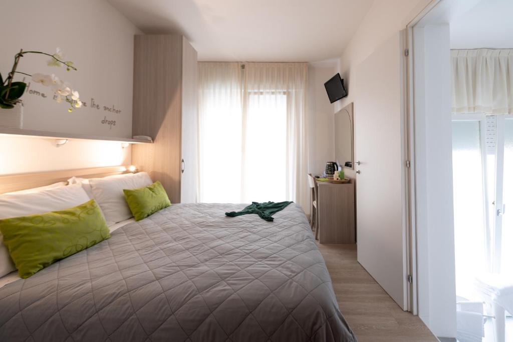 Postel nebo postele na pokoji v ubytování Hotel Anny