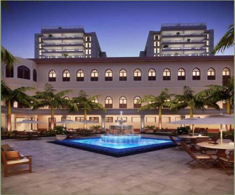 Hotel TIJUCA Atrium Top 3 Qts BEST LOCATION IN RIO, a large building with a swimming pool and palm trees at TIJUCA Atrium Top 3 Qts BEST LOCATION IN RIO in Rio de Janeiro