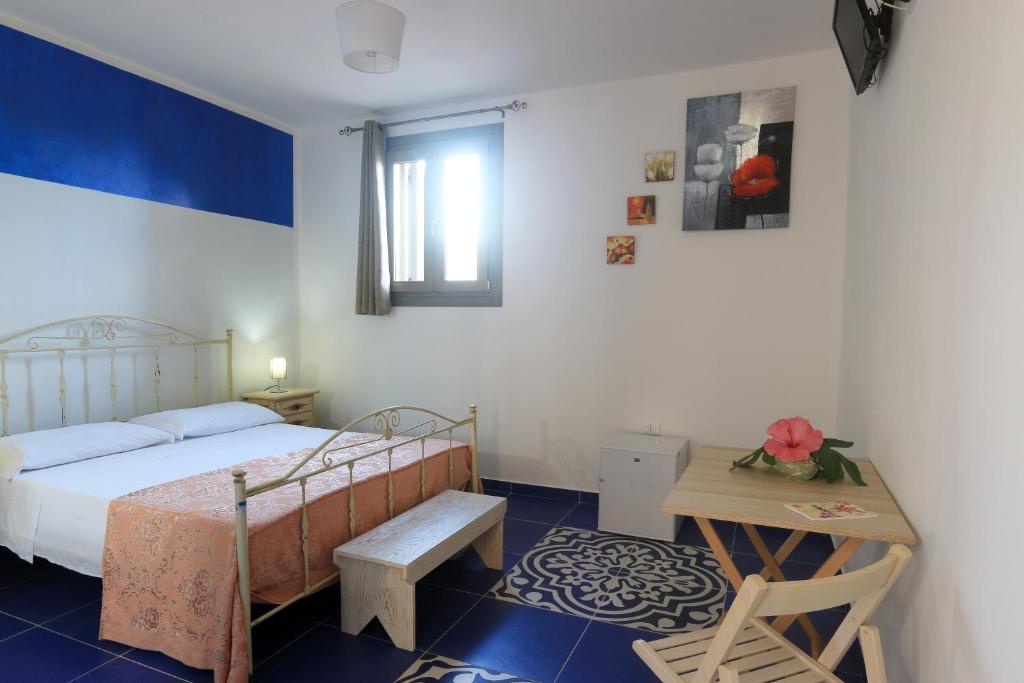 Postel nebo postele na pokoji v ubytování Allu Ruvezzu