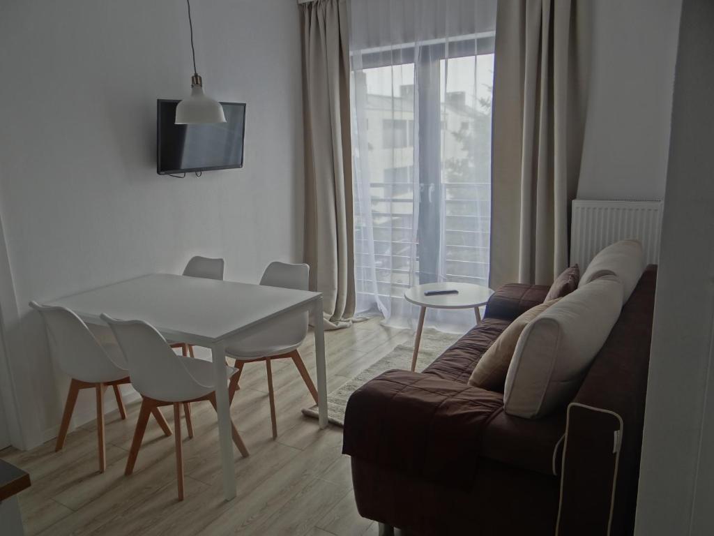 Telewizja i/lub zestaw kina domowego w obiekcie Dom Przy Plaży