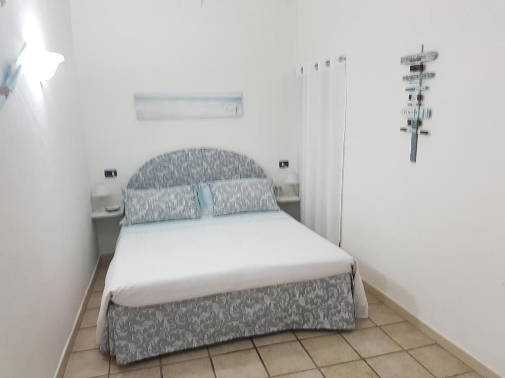 Postel nebo postele na pokoji v ubytování carugio del fezzano