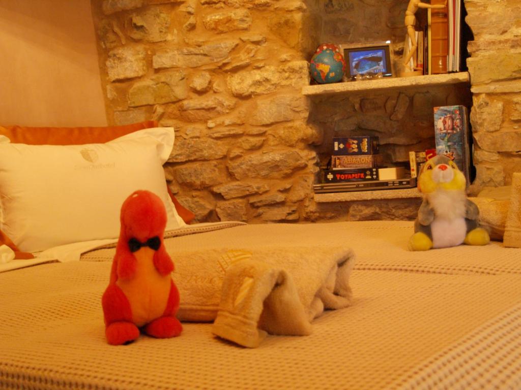 Postel nebo postele na pokoji v ubytování DonQuihotel Chalet