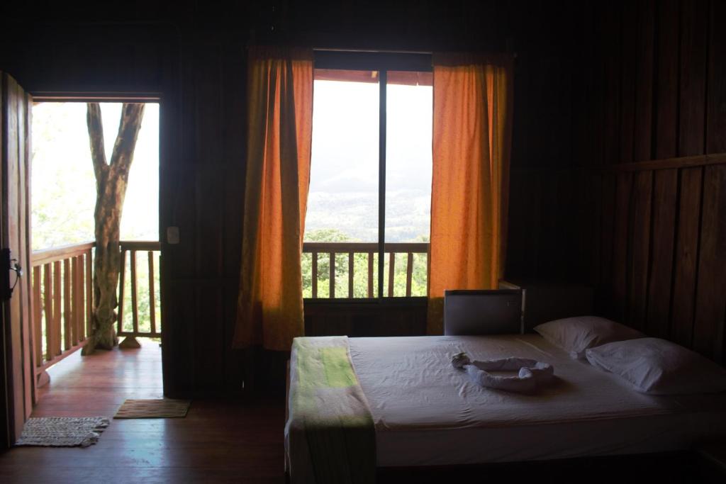 Postel nebo postele na pokoji v ubytování Casa Torre Eco- Lodge