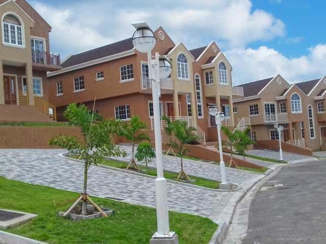 a row of street lights in front of a building at Tropical Luxury Dreams in Ocho Rios