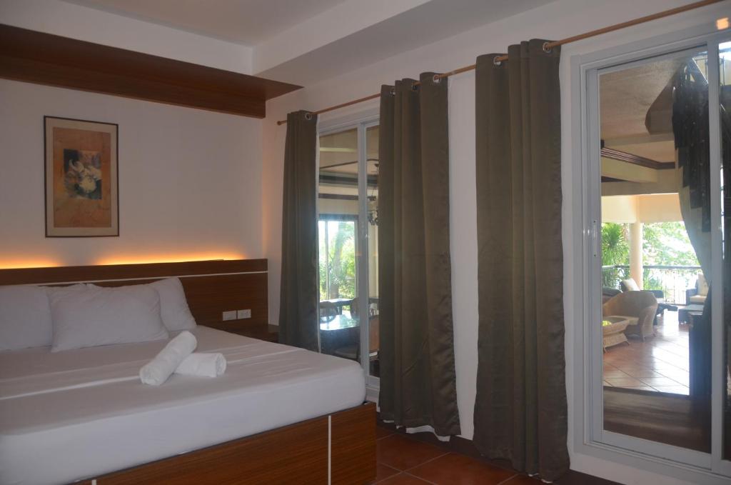 Postel nebo postele na pokoji v ubytování Robinland Vacation Home