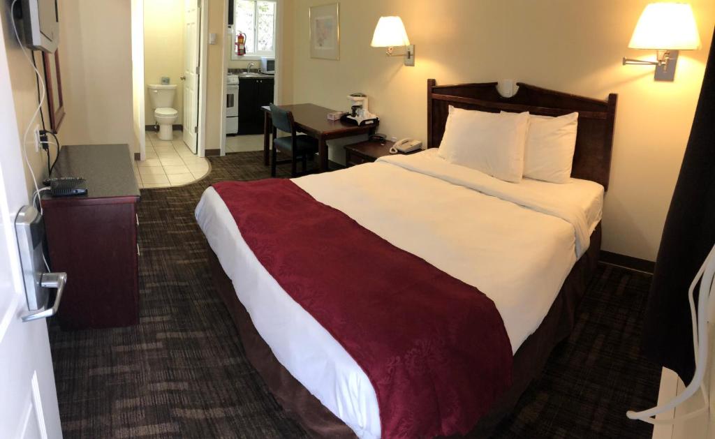 Postel nebo postele na pokoji v ubytování Kings Motor Inn