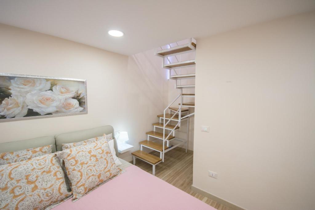 Postel nebo postele na pokoji v ubytování Al Vecchio Fontanile