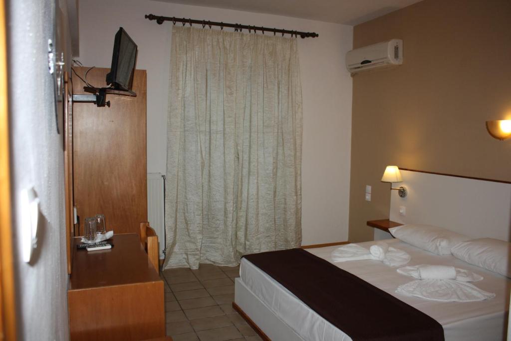 Postel nebo postele na pokoji v ubytování Vanta Hotel