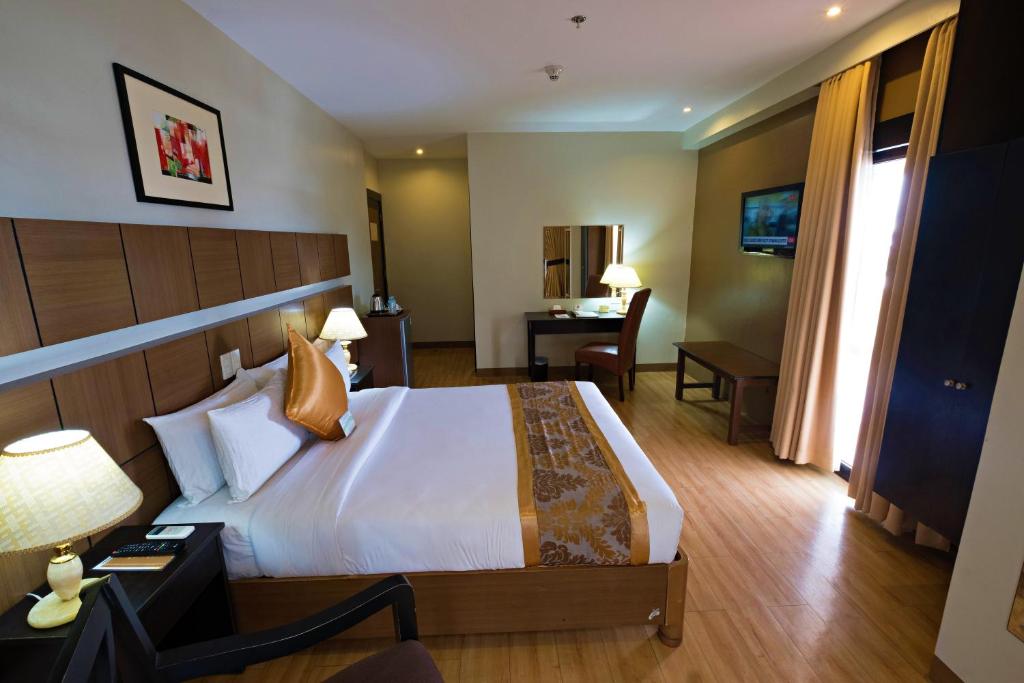 Katil atau katil-katil dalam bilik di The Pinnacle Hotel and Suites