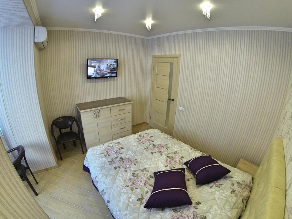 Ліжко або ліжка в номері Apartamienty v "Riezidientsii-2"