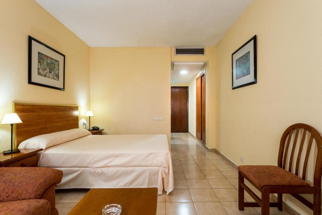 Postel nebo postele na pokoji v ubytování Apartamentos Resitur