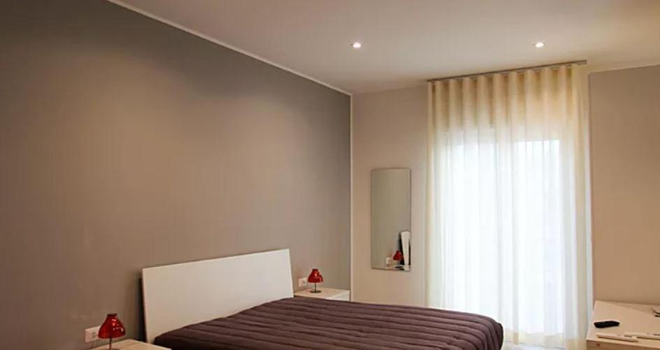 Postel nebo postele na pokoji v ubytování Matera Sassi Rooms 21/a e 21/b