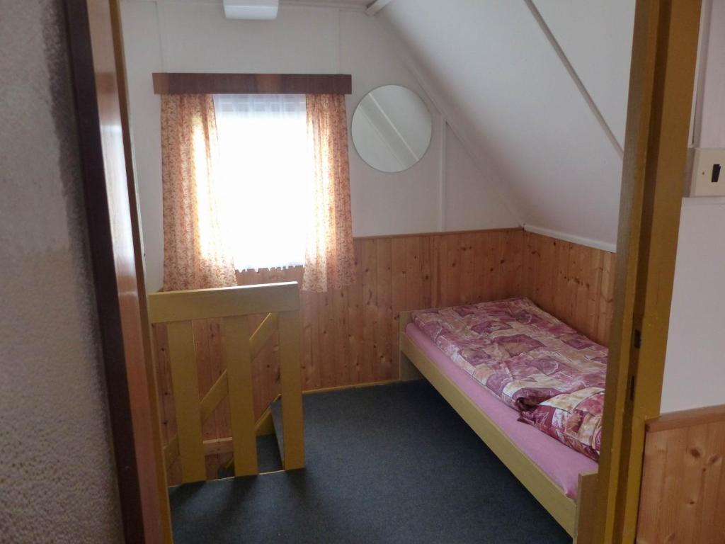Voodi või voodid majutusasutuse Chaty Vysočina toas