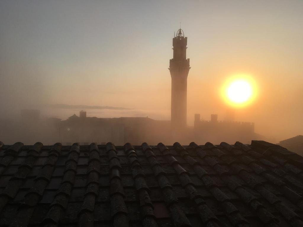 Pohľad na východ alebo západ slnka z apartmánu alebo blízkeho okolia