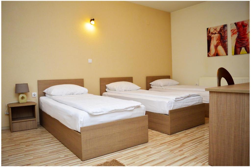 Postel nebo postele na pokoji v ubytování Hotel Treff