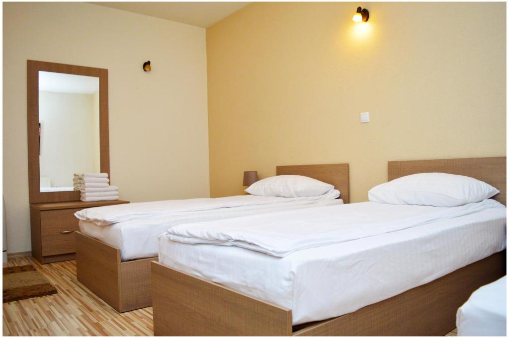Postel nebo postele na pokoji v ubytování Hotel Treff