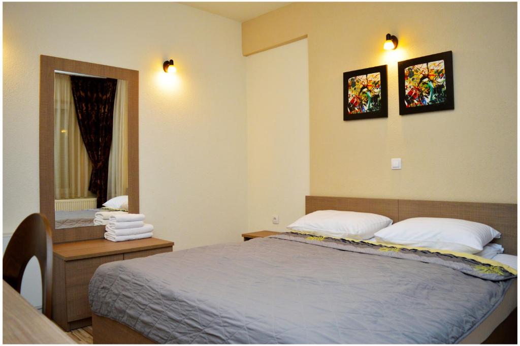 Postel nebo postele na pokoji v ubytování Hotel Treff
