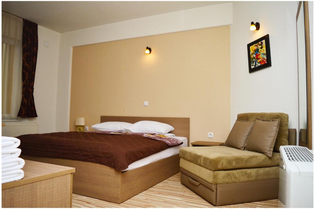 Postel nebo postele na pokoji v ubytování Hotel Treff