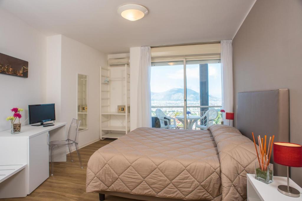 Postel nebo postele na pokoji v ubytování Hotel Bel 3