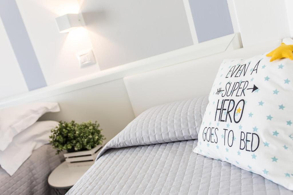 Postel nebo postele na pokoji v ubytování Hotel Geminus B&B