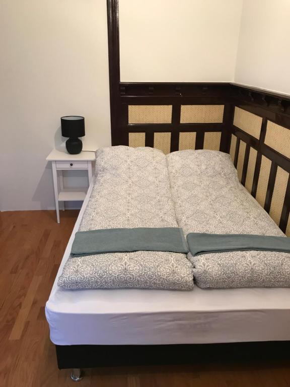Postel nebo postele na pokoji v ubytování Lava Guesthouse