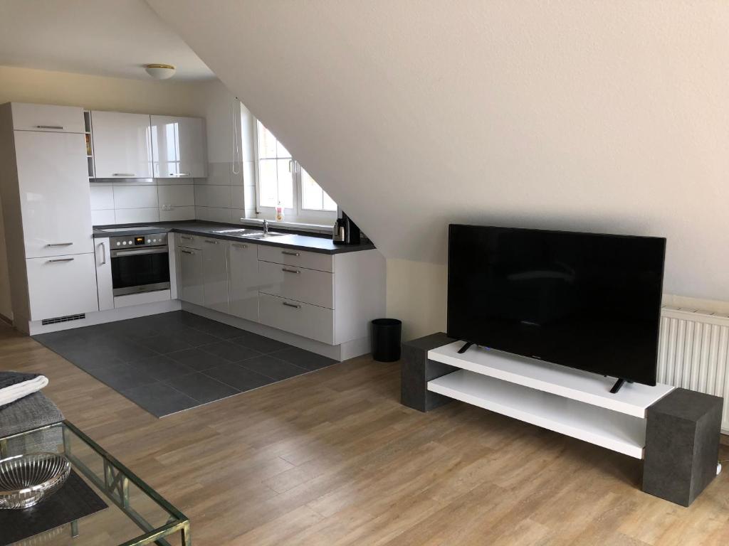 Kuchyň nebo kuchyňský kout v ubytování Ferienwohnung "Kranich" im Ferien-Resort Rügen