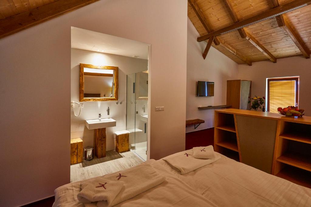 Postel nebo postele na pokoji v ubytování Hotel Ryzlink