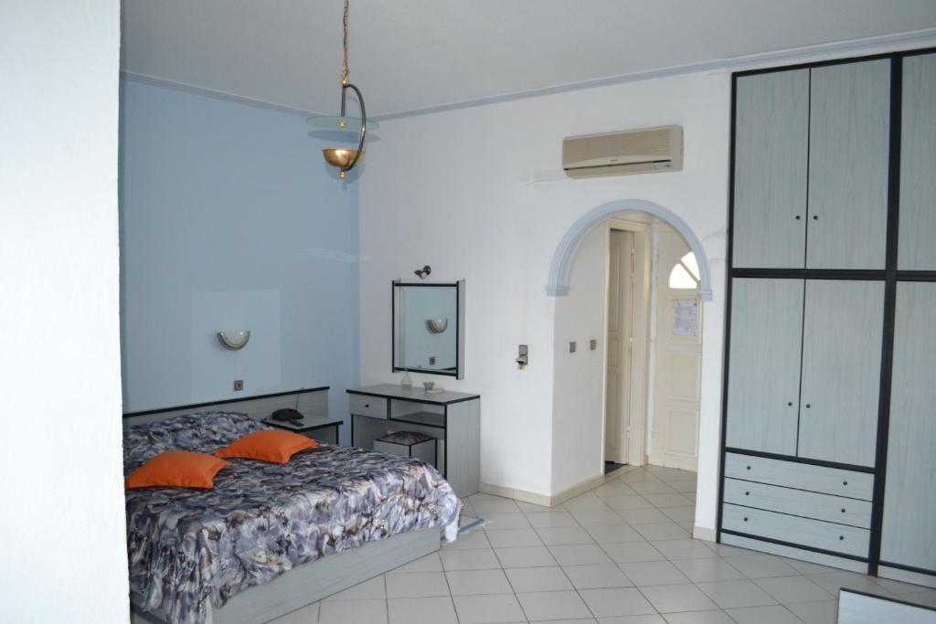 Una cama o camas en una habitación de Dolphin Apartments 1