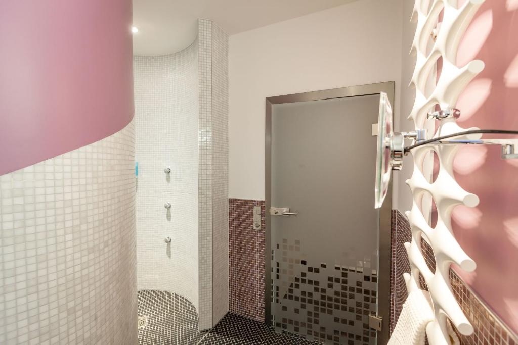 Koupelna v ubytování Aragon - Hotel - Garni