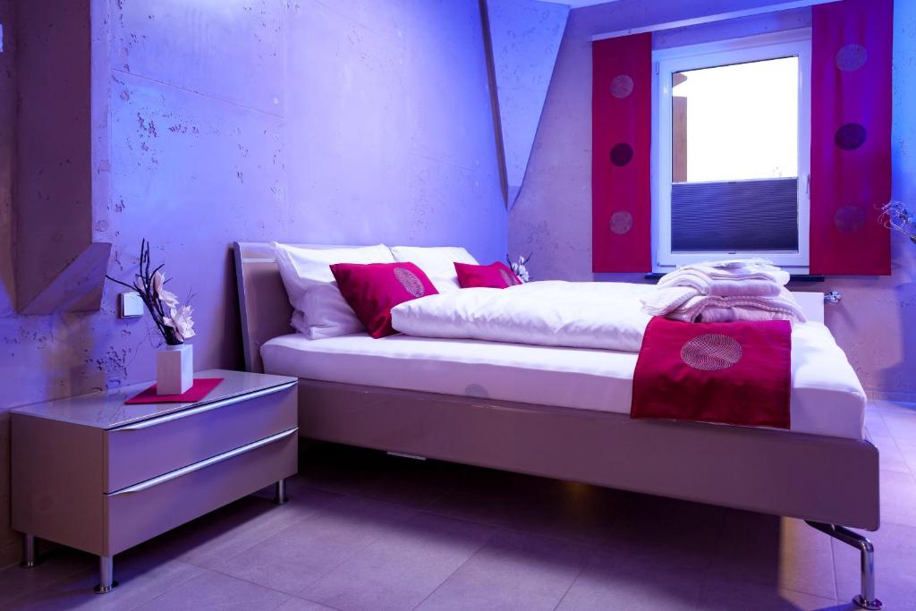 Postel nebo postele na pokoji v ubytování Aragon - Hotel - Garni