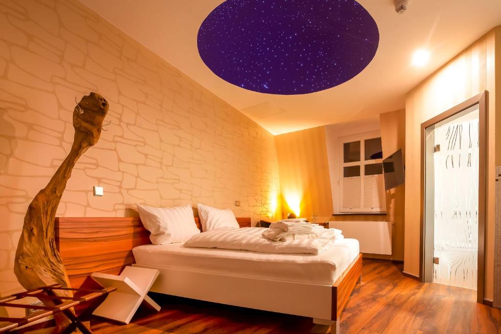 Postel nebo postele na pokoji v ubytování Aragon - Hotel - Garni