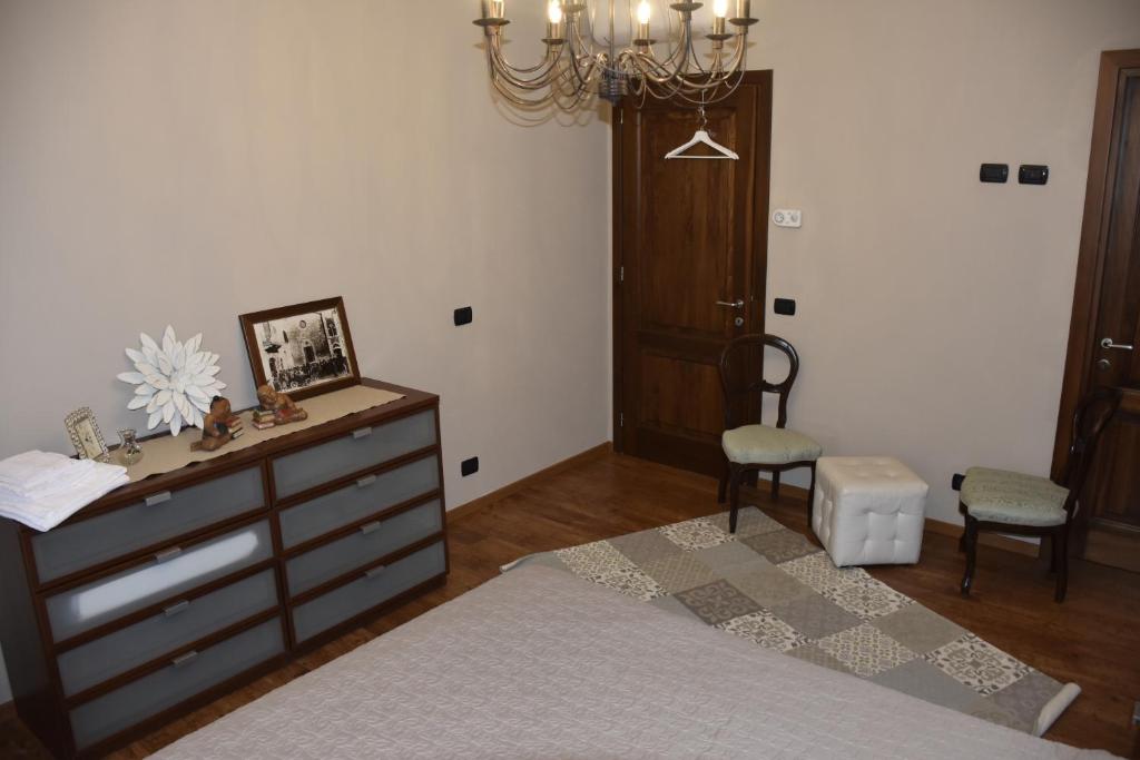 Postel nebo postele na pokoji v ubytování La Torre Rooms