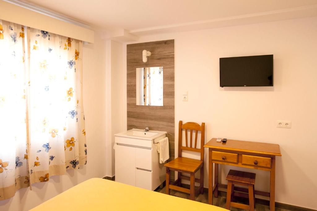 A television and/or entertainment centre at Serramar