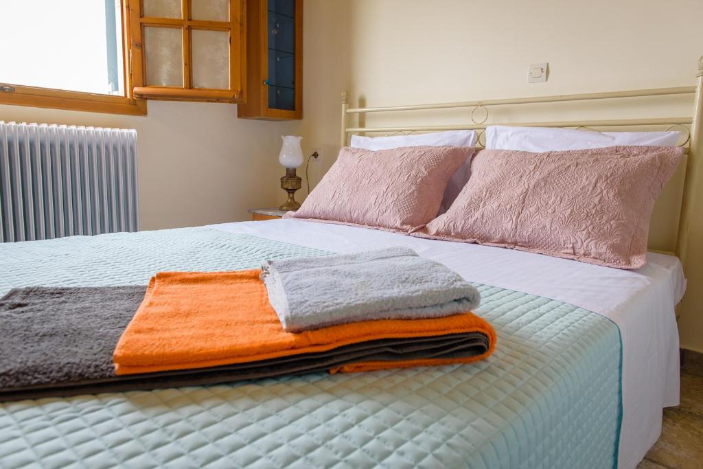 Postel nebo postele na pokoji v ubytování Marianna Cottage