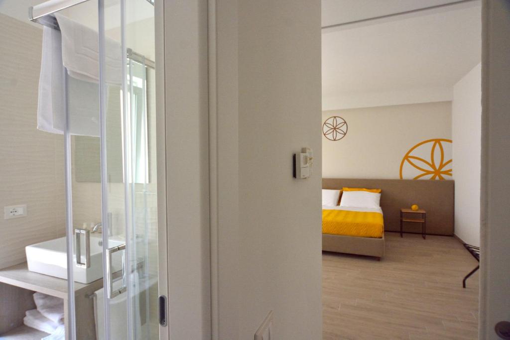 A bed or beds in a room at Il Rifugio Dei Templari
