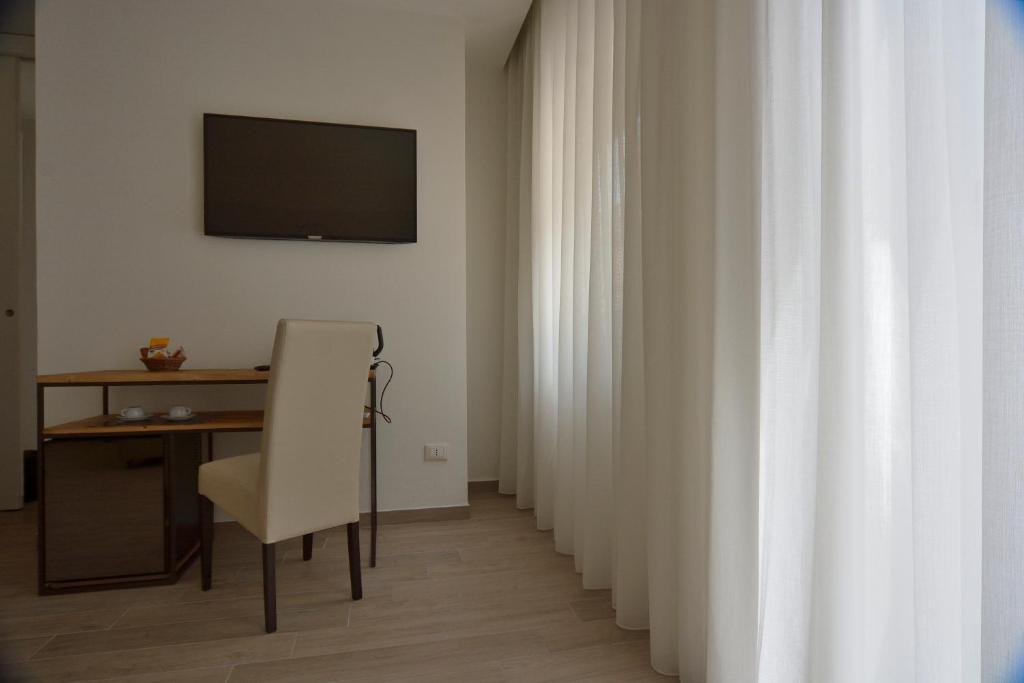 A television and/or entertainment centre at Il Rifugio Dei Templari
