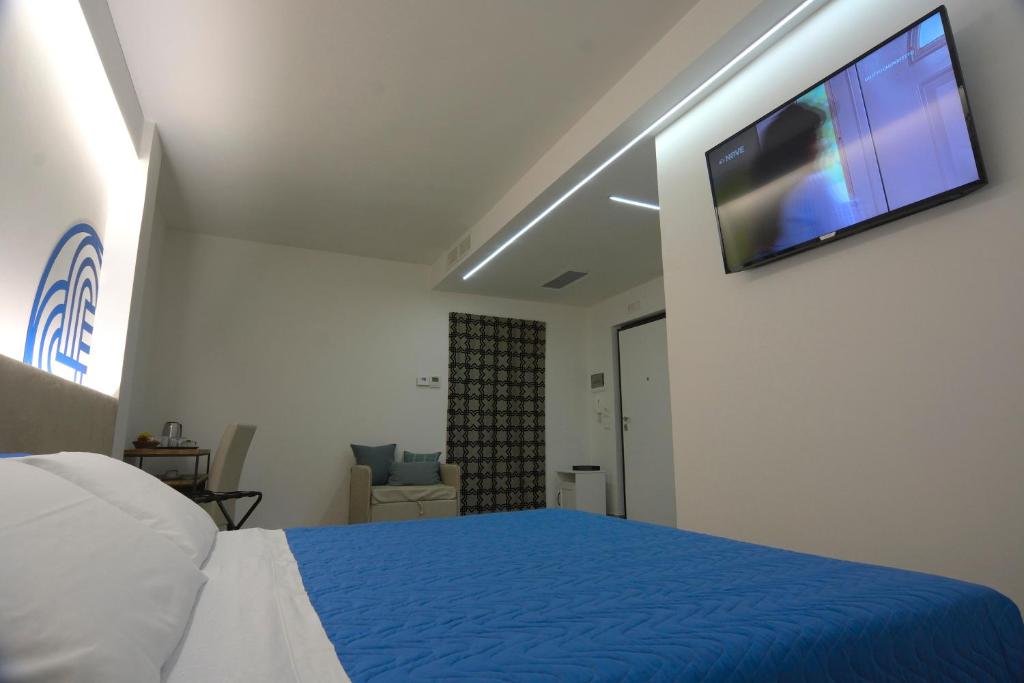 A television and/or entertainment centre at Il Rifugio Dei Templari