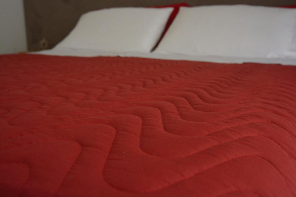 A bed or beds in a room at Il Rifugio Dei Templari