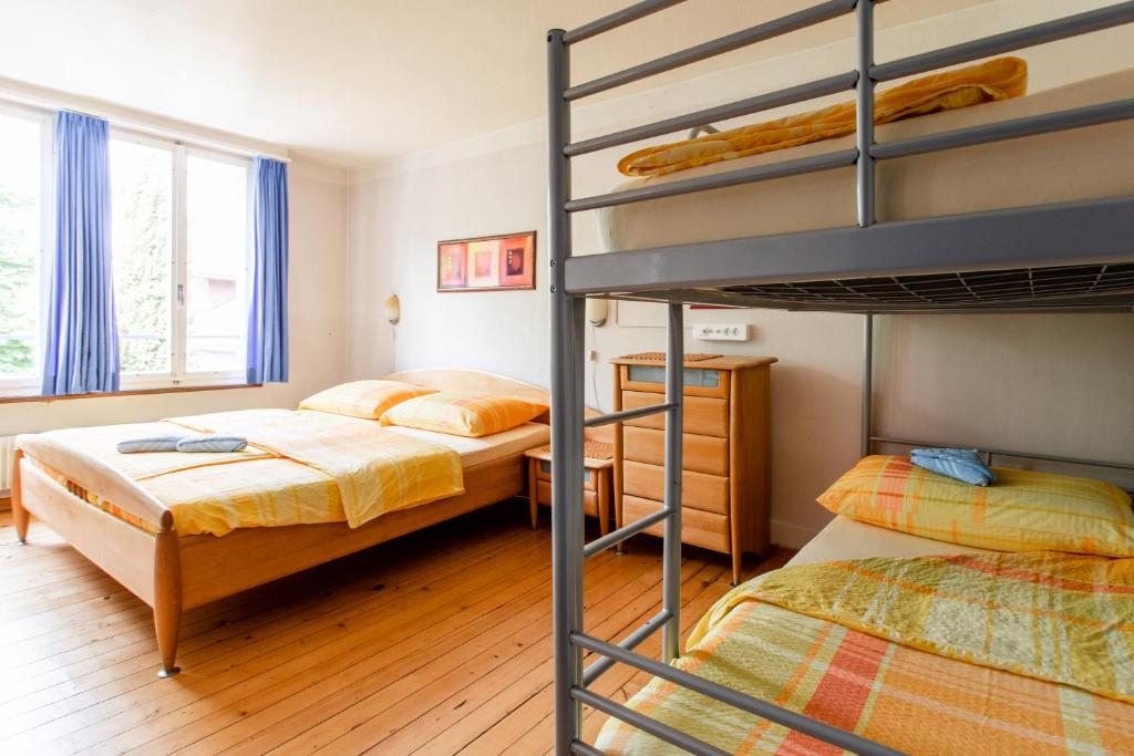 Postel nebo postele na pokoji v ubytování Happy Inn Lodge