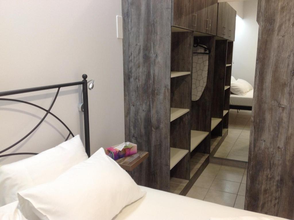 Posteľ alebo postele v izbe v ubytovaní Eva Rooms