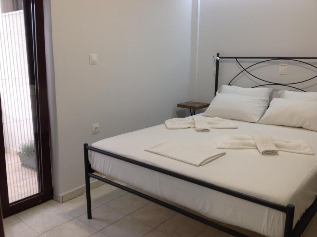 Posteľ alebo postele v izbe v ubytovaní Eva Rooms