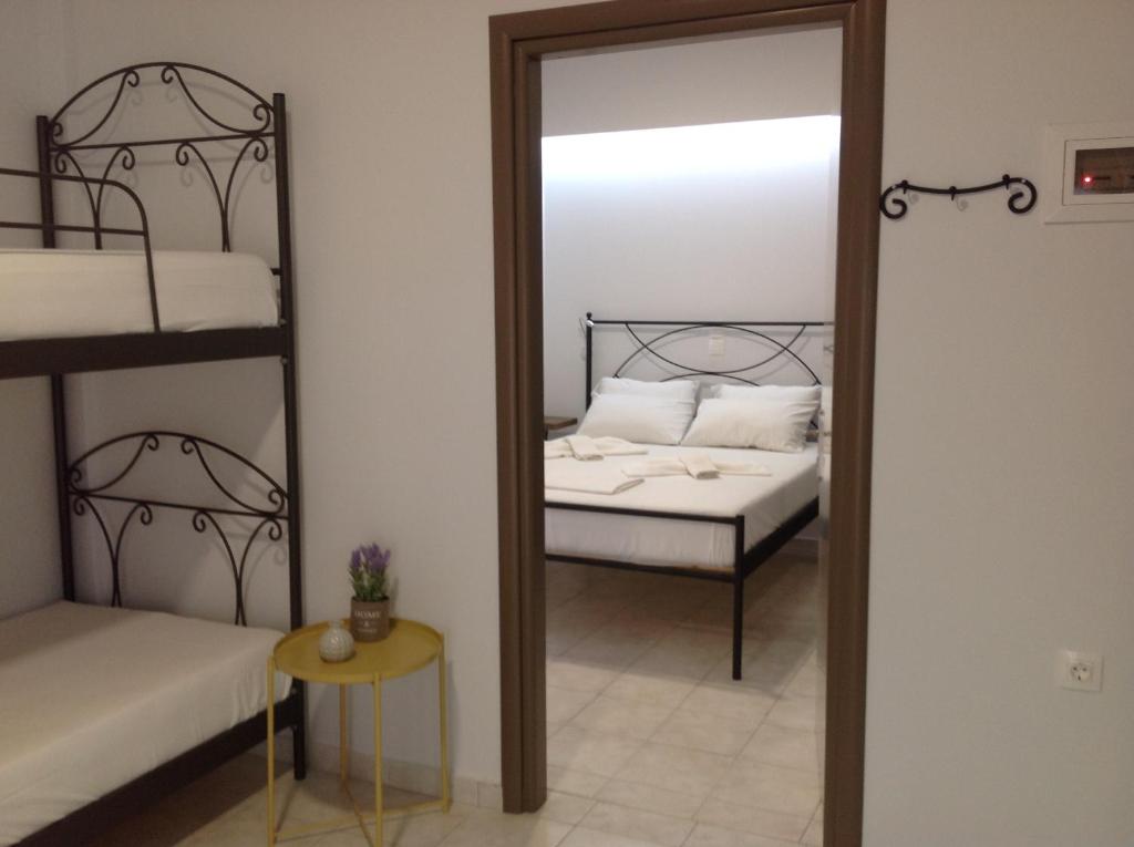 Posteľ alebo postele v izbe v ubytovaní Eva Rooms
