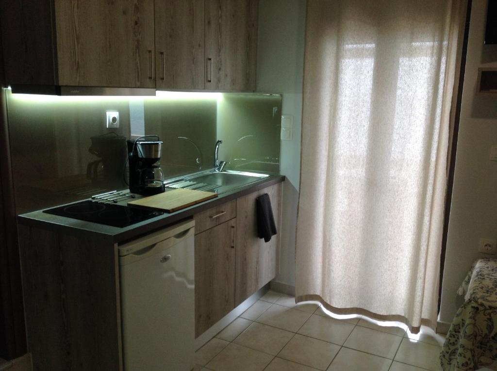 Kuchyňa alebo kuchynka v ubytovaní Eva Rooms