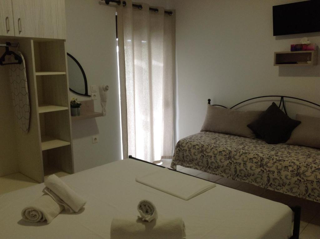 Posteľ alebo postele v izbe v ubytovaní Eva Rooms