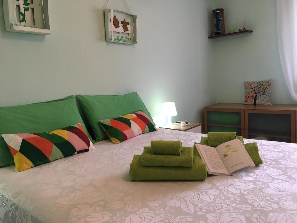 Posteľ alebo postele v izbe v ubytovaní A casa di Nonna Maria