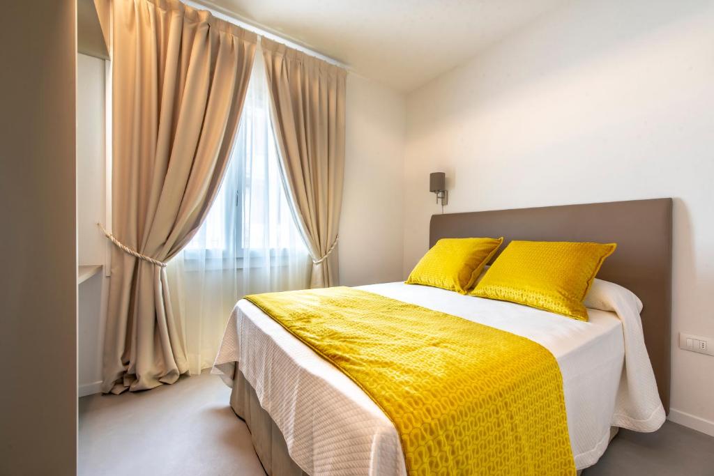 Postel nebo postele na pokoji v ubytování Casa Ercoli B&B
